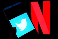 In this photo illustration, a Twitter logo is displayed on a