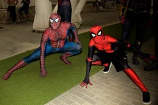 Spiderman cosplayers pose during the 29th edition of Romics