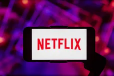 In this photo illustration, the Netflix logo is seen