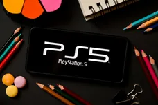 In this photo illustration a PlayStation 5 logo seen