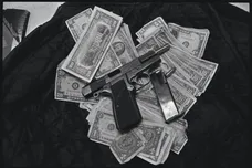 Gun and Money Collected by Gang Squad
