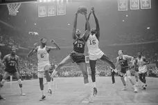 Wilt Chamberlain and Bill Russell Fighting for Rebound