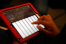 A student uses the GarageBand application on a iPad to make music during a "Girls On The Mic" class at the Women's Audio Mission studio on Thursday, Sept. 14, 2017, in Oakland, Calif.  Women's Audio Mission is a San Francisco-based non-profit whose missio
