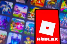 In this photo illustration, the Roblox logo seen displayed