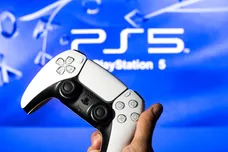 In this photo illustration, a PlayStation 5 controller seen
