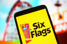 In this photo illustration the Six Flags Entertainment
