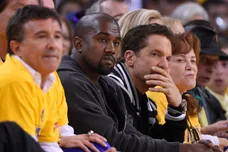May 27, 2015; Oakland, CA, USA; Entertainer and rapper Kanye West (middle) during the first half against the Houston Rockets in