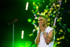 Kid Cudi gestures to the crowd after a song in his set in the Sahara tent during the Coachella Valley Music and Arts Festival in