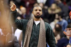 Mar 4, 2016; Toronto, Ontario, CAN; Toronto Raptors ambassador and rap artist Drake celebrates a basket by his team against the