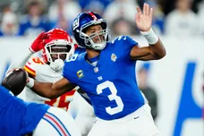 New York Giants quarterback Russell Wilson (3) passes to a teammate before Kansas City Chiefs cornerback Jaylen Watson (35) can