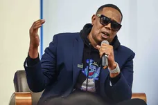 Percy Robert Miller Sr. known by his stage name Master P, deliver remarks to the audience during a lecture at the Wilmington