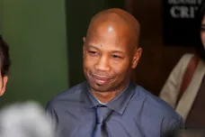 Hernandez Govan smiles while speaking to the media after he was found not guilty on all charges regarding his possible role in