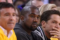 May 27, 2015; Oakland, CA, USA; Entertainer and rapper Kanye West (middle) during the first half against the Houston Rockets in