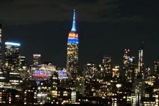 The Empire State Building lit up blue and orange Wednesday night after the Mets won their National League Division Series on