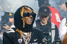 Lil Wayne comes out of the CU football locker room to give a live pregame performace before the Rocky Mountain Showdown on Sept.