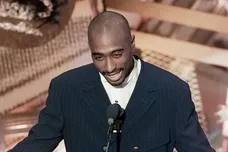 Tupac Shakur presents an award at the 38th Annual Grammy Awards at the Shrine Auditorium.