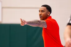 Pike High School head coach Jeff Teague gestures during the first half of a Metropolitan Interscholastic Conference championship