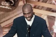 Tupac Shakur presents an award at the 38th Annual Grammy Awards at the Shrine Auditorium.