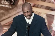 Tupac Shakur presents an award at the 38th Annual Grammy Awards at the Shrine Auditorium.