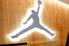 A hallway of the locker room, leading to the coaches office features an Air Jordan logo. The Marquette mens' basketball team