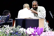 Kanye West hugs Pastor Adam Tyson at the annual Strength to Stand Youth Conference at the LeConte Center in Pigeon Forge, Tenn.