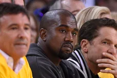 May 27, 2015; Oakland, CA, USA; Entertainer and rapper Kanye West (middle) during the first half against the Houston Rockets in