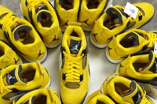 Air Jordan 4 Retro   Lightning   sneakers sit on a display at Coastal Kicks in Mary Esther. The shoe was one of the more popular