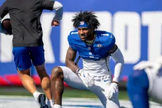 New York Giants wide receiver Malik Nabers (1) stretches during a week 6 NFL football game between New York Giants and New