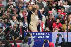 President Donald Trump invites Rapper Nicki Minaj onstage during a midterm rally at McMorran Place Arena in Port Huron on