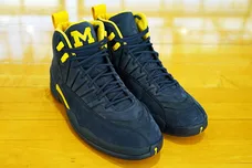 Image Via <a href='https://sneakernews.com/2018/03/20/psny-air-jordan-12-michigan-release-info/' rel="nofollow noopener" target='_blank'>SN</a>