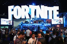 Game enthusiasts and industry personnel visit the 'Fortnite' exhibit during the Electronic Entertainment Expo E3 at the Los Angeles Convention Center on June 12, 2018 in Los Angeles, California.