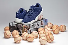 Image Via <a href='https://www.sneakerfreaker.com/sneakers/where-to-buy-the-derek-jeter-x-air-jordan-11-low-re2pect/' rel="nofollow noopener" target='_blank'>SneakerFreaker</a>