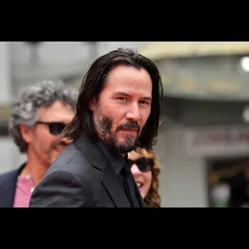 Keanu Reeves Places His Hand Prints In Cement At TCL Chinese Theatre IMAX Forecourt