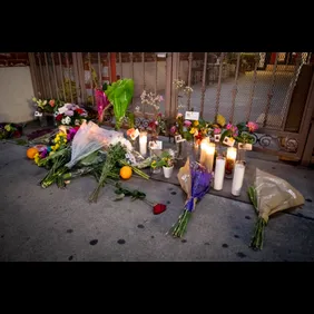 A memorial grows outside the Montery Park Dance Studio Shooting Site