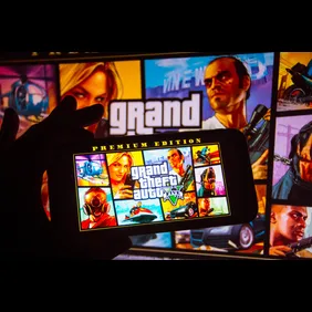 In this photo illustration the Grand Theft Auto (GTA) logo