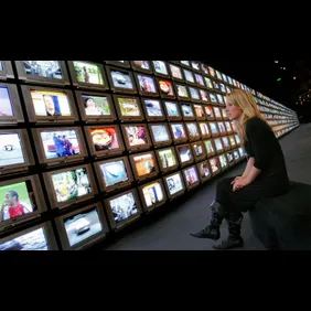 Elizabeth Muling inspects a wall of some