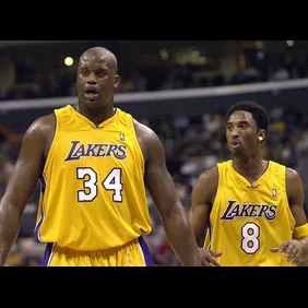 The Los Angeles Lakers' Shaquille O'Neal (L) and K
