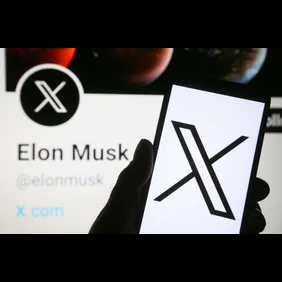 In this photo illustration, the new Twitter logo rebranded