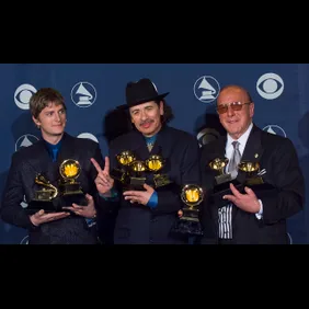 Winners Carlos Santana with Rob Thomas and Clive Davis at Grammy Awards Show 2000