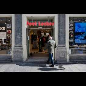 A man walks in into the American multinational sportswear