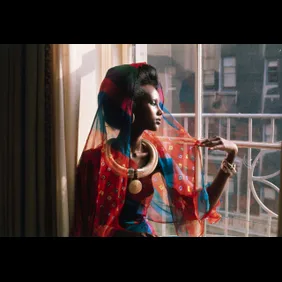 Fashion Model Iman by Window