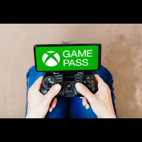 In this photo illustration, a person playing on a joystick