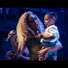 Rico Nasty (Maria-Cecilia Simone Kelly ) on stage with her son Tuesday evening at the Fillmore Silver Spring.