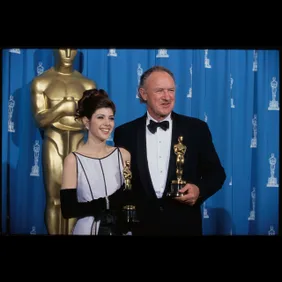 Marisa Tomei and Gene Hackman Holding Awards