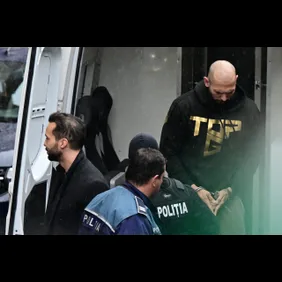 TOPSHOT-ROMANIA-BRITAIN-US-COURT-CRIME