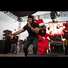 Top Dawg Entertainment (TDE) throws its 10th annual toy drive and concert featuring SZA, Jay Rock, YG and other TDE artists performing followed by a gift giveaway to kids in the Nickerson Gardens housing projects