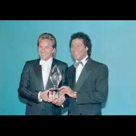 Don Johnson and Michael Thomas Holding Awards