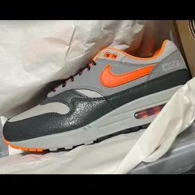 HUF-Nike-Air-Max-1-Brilliant-Orange-HF3713-001-2024