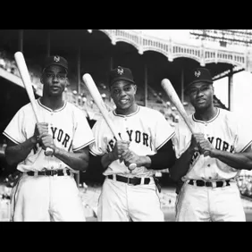 Baseball Sluggers Posing with Baseball Bats