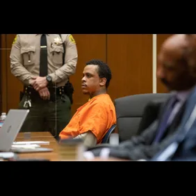 Eric Holder listens during sentencing proceeding